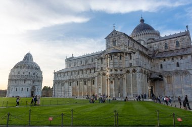 Pisa, Italy, 14 April 2022: View of the cathedral and the Baptistery