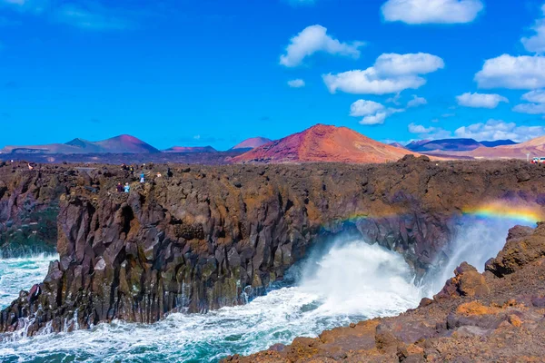 Beautiful Rainbow Caused Crashing Ocean Waves Volcanic Cliffs Los Hervideros Stock Photo