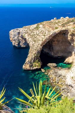 The Blue Grotto of Malta, rock formation on the sea with crystal clear water