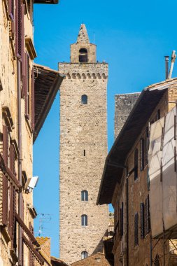 Ancient medieval tower in the town center of San Gimignano, Tuscany, Italy