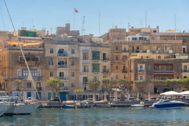 Birgu, Malta, 22 May 2022: View of Cospicua, one of the three cities, from the marina of Birgu