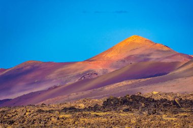 Wild volcanic landscape of the Timanfaya National Park, Lanzarote, Canary Islands, Spain