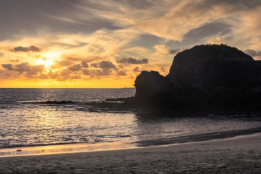 Beautiful sunset over the Atlantic Ocean at Papagayo Beach, Lanzarote, Canary Islands, Spain