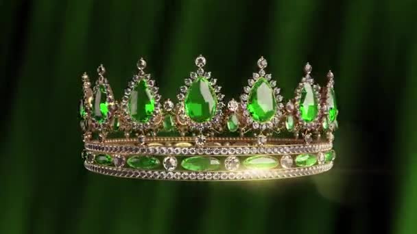 輝く宝石が緑の背景に3D空間で回転する黄金の冠 — ストック動画