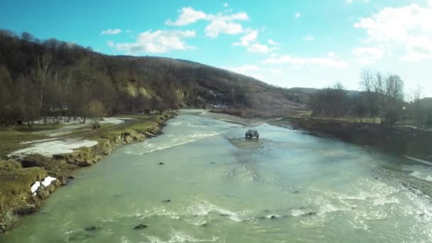Aerial View 4X4 Road Vehicle Crossing River — Stock Video
