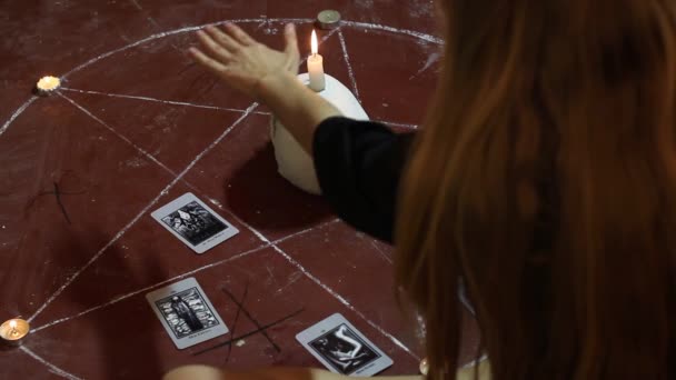 Young Girl Makes Black Satanic Ritual Tarot Cards — Stok Video
