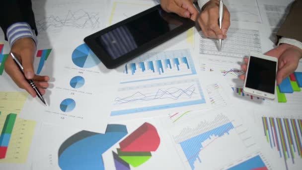 Businessmen Working Charts Graphs Using Gadgets — ストック動画