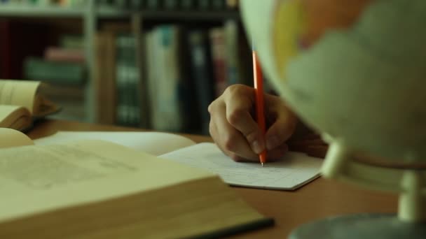 Girl Writes Notebook — Stock video