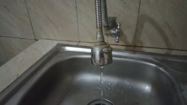 water faucet in the kitchen sink