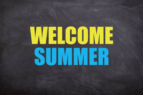 Welcome summer yellow and blue text with blackboard background for summer season. This image is about welcome summer and summer season.