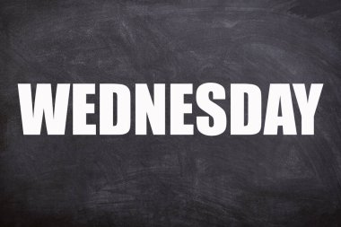 Wednesday text with blackboard background. And Wednesday is the third day of the week.