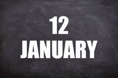 12 January text with blackboard background for calendar. And January is the first month of the year.