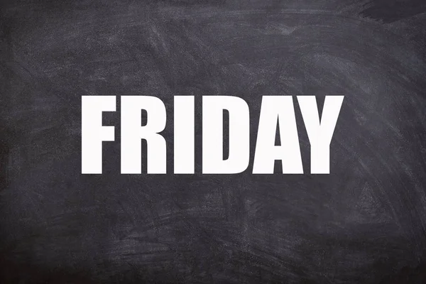 Friday text with blackboard background. And Friday is the fifth day of the week.