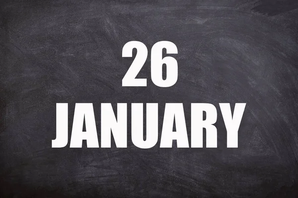 26 January text with blackboard background for calendar. And January is the first month of the year.