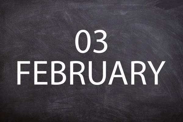 03 February text with blackboard background for calendar. And February is the second month of the year.