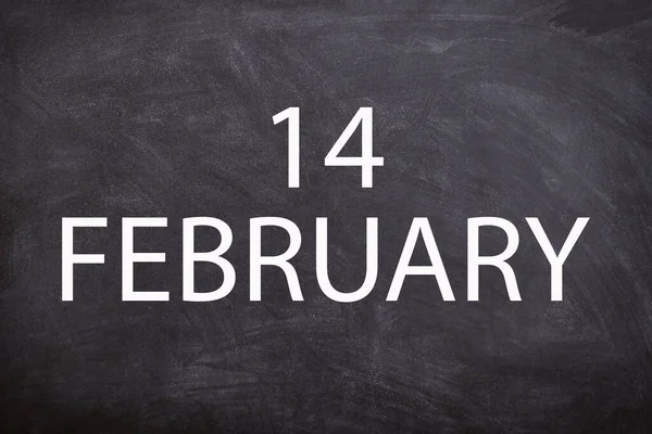 14 February text with blackboard background for calendar. And February is the second month of the year.