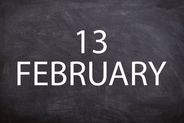 13 February text with blackboard background for calendar. And February is the second month of the year.