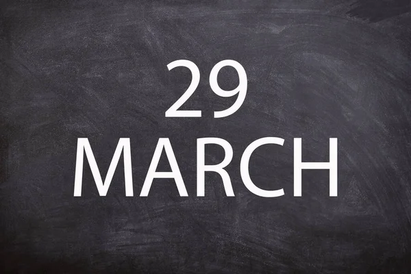 29 march text with blackboard background for calendar. And march is the third month of the year