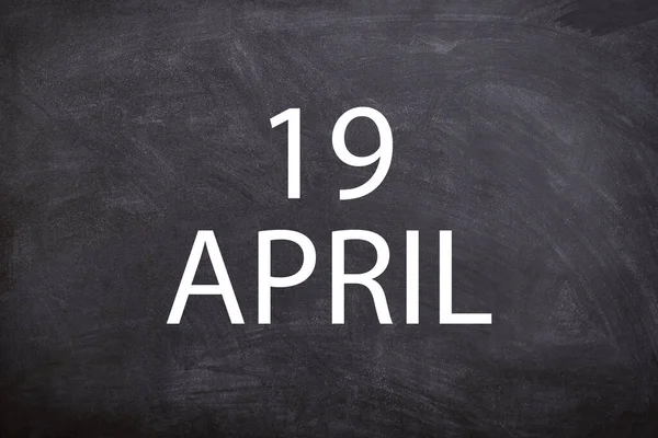 19 April text with blackboard background for calendar. And april is the fourth month of the year