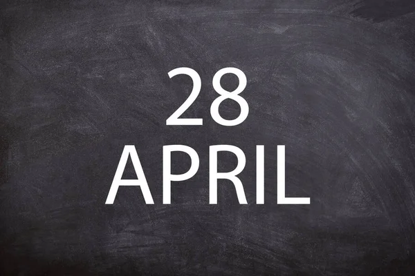 28 April text with blackboard background for calendar. And april is the fourth month of the year