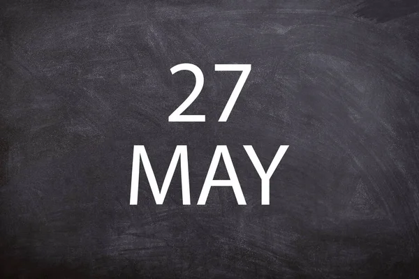 27 May text with blackboard background for calendar. And may is the fifth month of the year