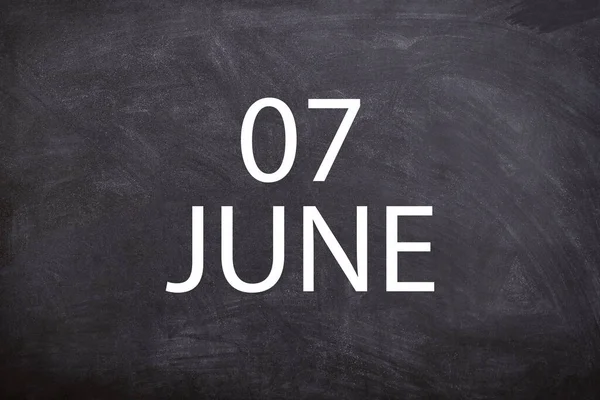 07 June text with blackboard background for calendar. And June is the sixth month of the year