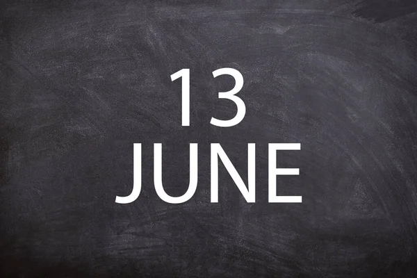 13 June text with blackboard background for calendar. And June is the sixth month of the year