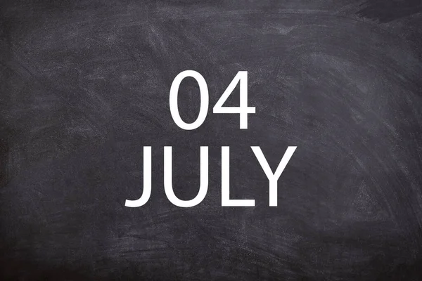 04 July text with blackboard background for calendar. And July is the seventh month of the year