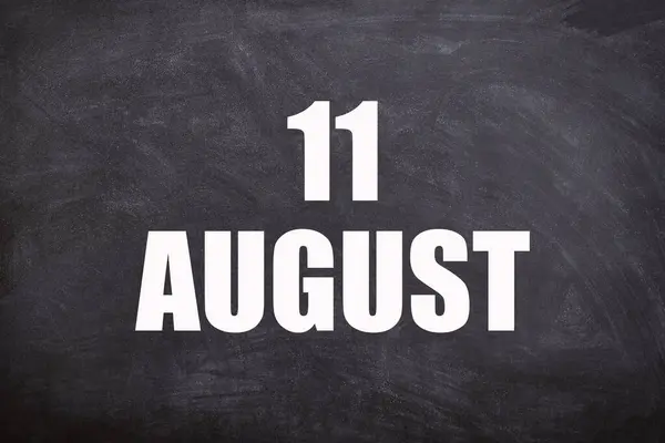 11 August text with blackboard background for calendar. And August is the eighth month of the year
