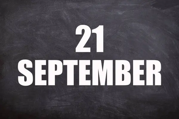 21 September text with blackboard background for calendar. And September is the ninth month of the year