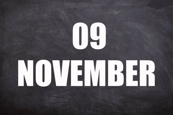 09 November text with blackboard background for calendar. And November is the eleventh and penultimate month of the year