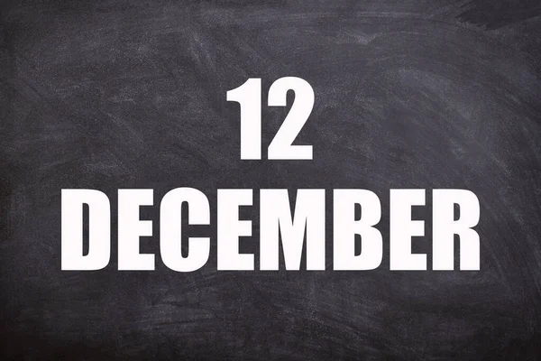 12 December text with blackboard background for calendar. And December is the twelfth and the final month of the year
