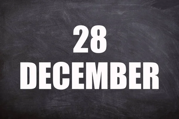 28 December text with blackboard background for calendar. And December is the twelfth and the final month of the year