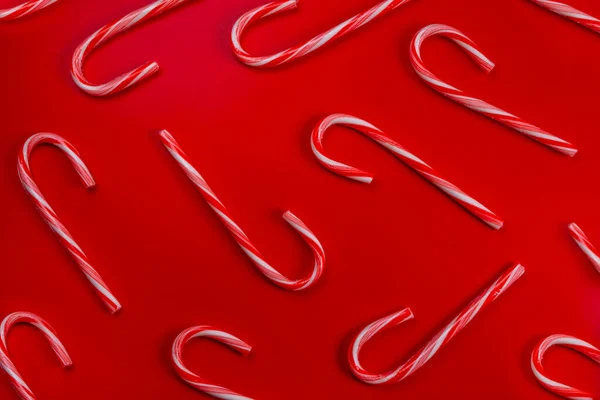  Kırmızı Noel ya da geleneksel şeker kamışında yeni yıl geçmişi. Yüksek kalite 