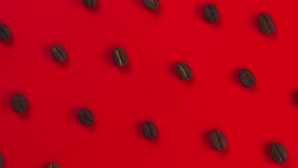 Czerwone Obrotowe Tło Ziarnami Kawy Wysokiej Jakości Materiał — Wideo stockowe