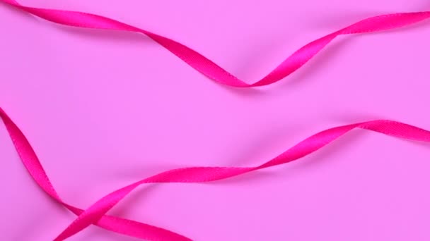 Rotating Pink Background Pink Ribbons Newborn Baby Girl Birthday Celebration — 图库视频影像
