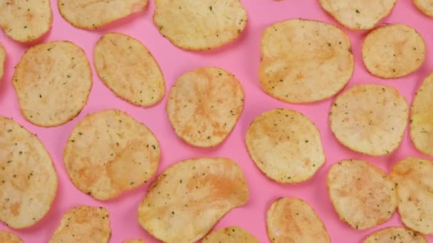 Rotating Pink Potato Chips Close Fashion Food Background — Stock Video