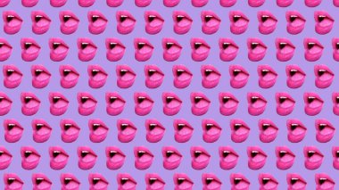 Pembe arka planda kadın dudaklarının ya da ağzının son moda renkli tekrarları. Yüksek kalite fotoğraf