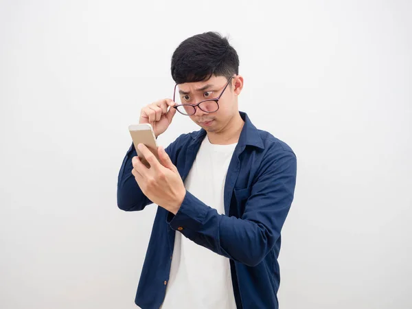 Asian Man Take Glasses Looking Cell Phone Hand Feeling Doubt — Stockfoto