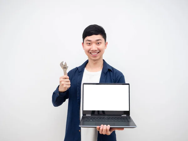 Asian Man Cheerful Hoding Laptop Adjustable Wrench Fixed Repair Concept — Zdjęcie stockowe