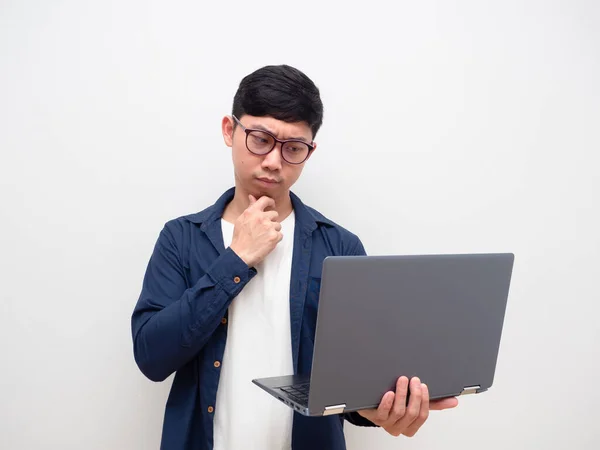 Man Wearing Glasses Looking Laptop His Hand Thinking Serious Face — Stock fotografie