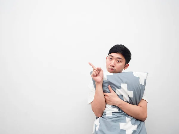 Asian Man Hugging Pillow Bored Face Point Finger Left Side — Photo
