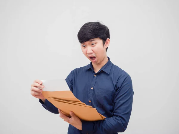 Asian Man Holding Document Envelope Reading Paper Hand Feeling Shocked — Stock fotografie