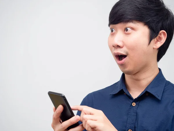 Asian Man Cheerful Feeling Happy Holding Mobile Phone Looking Space — Stockfoto