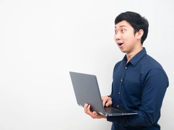 Man Holding Laptop Feeling Amazed Looking Copy Sapce —  Fotos de Stock