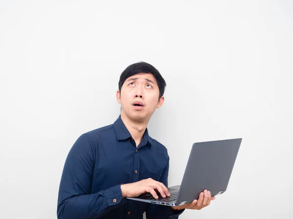 Asian Man Holding Laptop Feeling Shocked Looking Copy Space — Zdjęcie stockowe