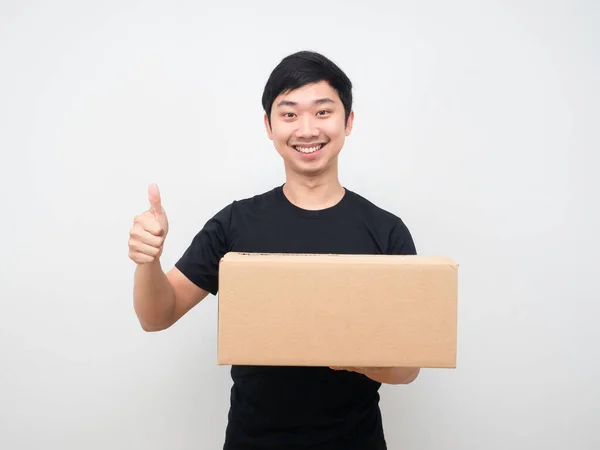 Man Holding Parcel Box Show Thumb Happy Smile — Stock Fotó