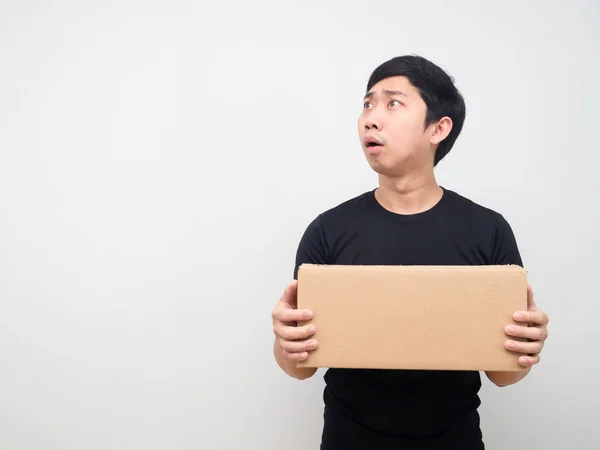 Man Feeling Shocked Holding Box Hand Looking Copy Space — Stock Fotó