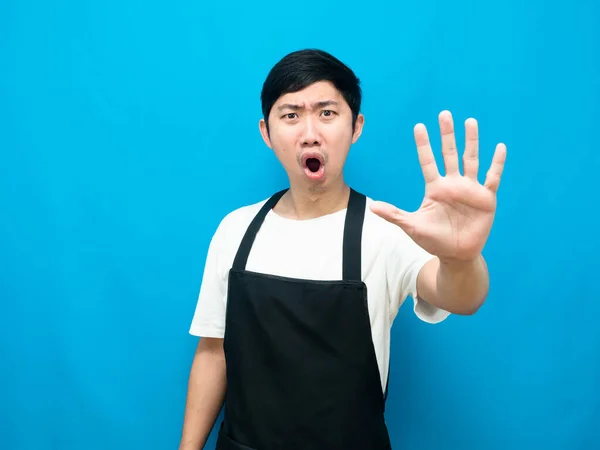 Man Wearing Apron Showing Hand Gesture Stop Blue Background — Stock fotografie