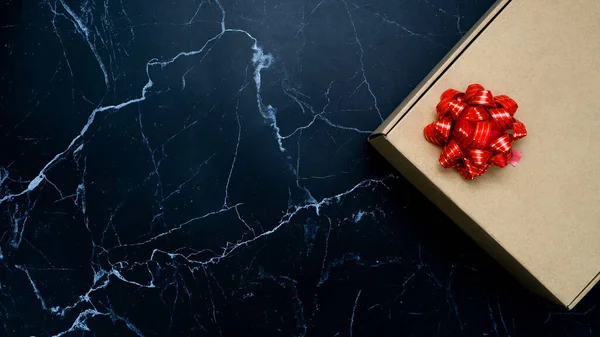 Gift Box Red Ribbon Black Marble Top View Copy Space — 스톡 사진